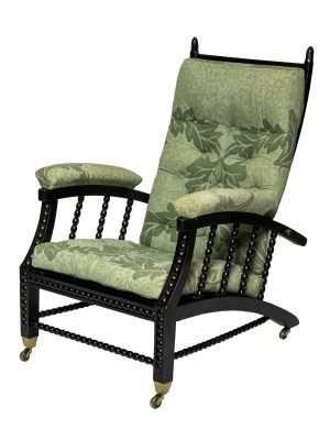 A classic Morris & Co. reclining chair by Paul Reeves London in green